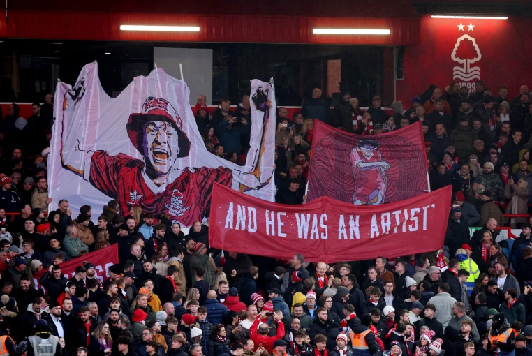Nottingham Forest fans with banners in tribute to former player John Robertson Reuters/Craig Brough