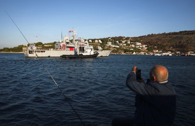 Italian navy ship Libra arrives with the first group of migrants in Albania, Florion Goga/Reuters