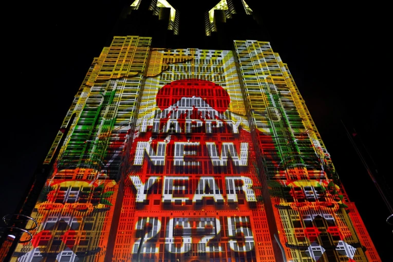 A projection mapping is displayed on the surface of the Tokyo Metropolitan Government building, to celebrate the New Year, in Tokyo, Japan January 1, 2025. REUTERS/Kim Kyung-Hoon TPX IMAGES OF THE DAY