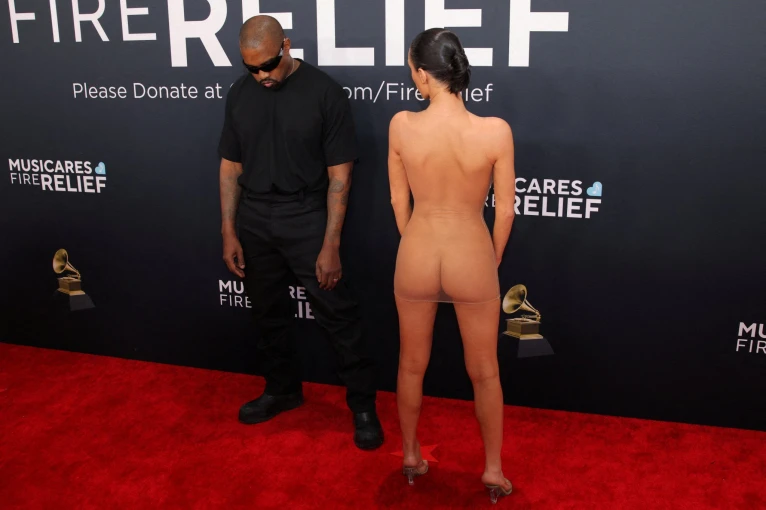 Kanye West and Bianca Censori pose at the red carpet during the 67th Annual Grammy Awards in Los Angeles, California - Reuters