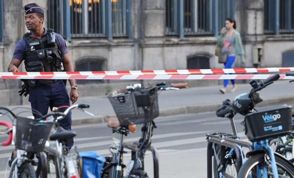 epa10724932 A police officer walks near the venue of the 'One Year to Go Paris 2024' (Dans un An Les Jeux Paris 2024) concert, held amid massive police presence following days of violent protests, in Paris, France, 03 July 2023. Violence broke out across 
