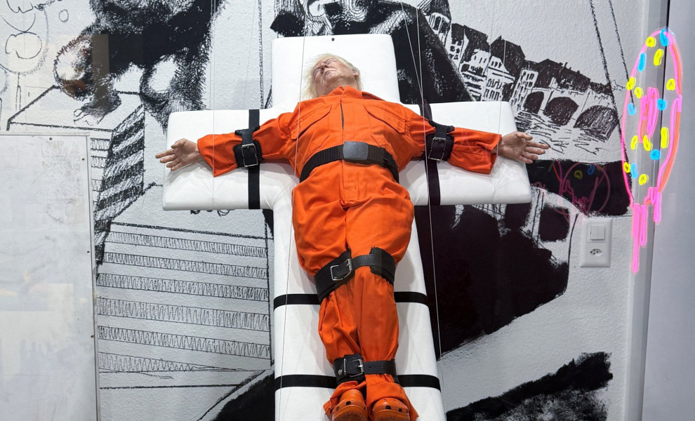 "Saint or Sinner", a sculpture by the London artist Mason Storm that depicts US President Donald Trump - Reuters