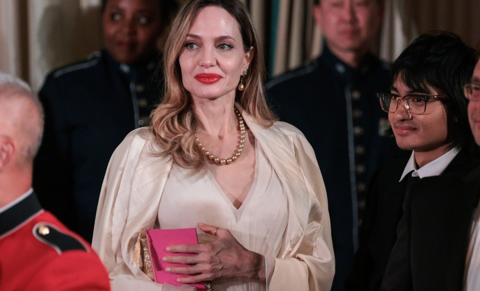 epa10593756 US Actor Angelina Jolie and her son Maddox Jolie-Pitt speak to guests during the State Dinner for South Korean President Yoon Suk-yeol of the Republic of Korea hosted by US President Joe Biden held in the East Room of the White House in Washin