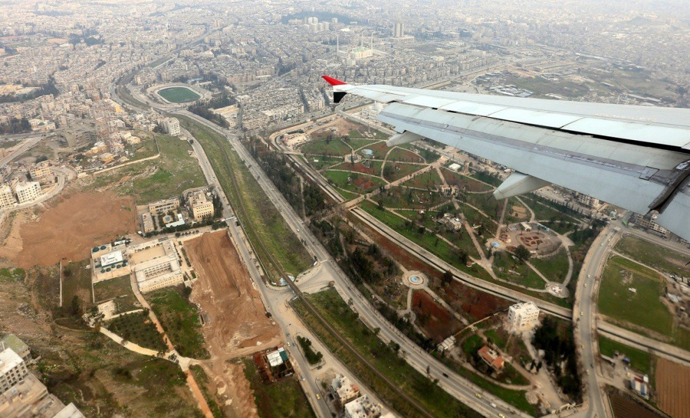 epa08228295 An aerial view taken from a SyrianAir passenger plane over the city of Aleppo, Syria, 19 February 2020. The Syrian government on 19 February organized a tour for reporters in the city of Aleppo after the reopening of the airport and eruption o