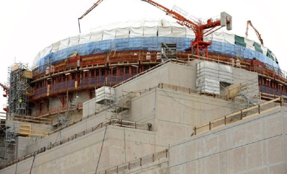 In this March 23, 2011 photo,the nuclear power plant Olkiluoto 3 'OL3' is pictured under construction in Eurajoki, south-western Finland. Halfway around the globe from Japan's atomic emergency, engineers building a cutting-edge nuclear reactor along Finla