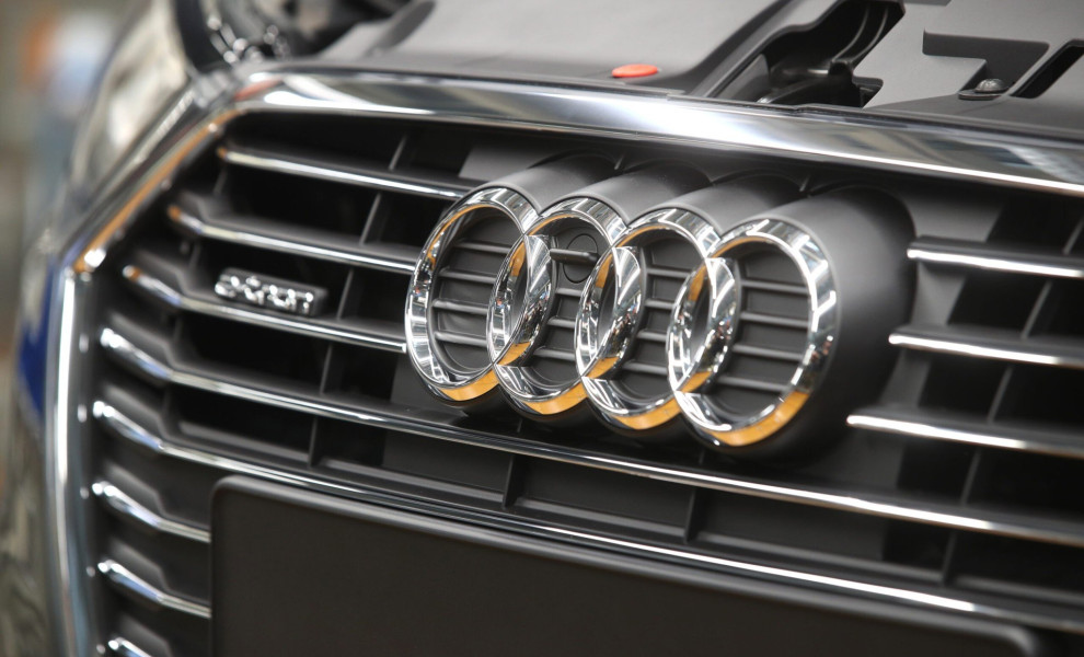 FILE PHOTO: The Audi logo is seen on the car at the production line of the German car manufacturer's plant in Ingolstadt, Germany, March 14, 2018. REUTERS/Michael Dalder