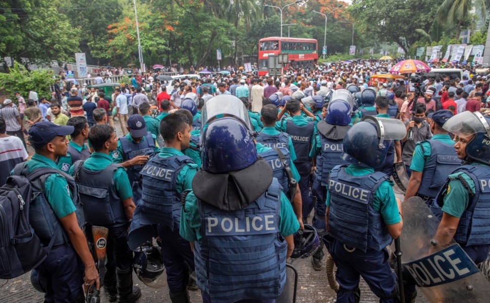 epa10683462 Bangladesh police officers stand guard as Jamaat-e-Islami members join a rally at the Institute of Engineers' auditorium in Dhaka, Bangladesh 10 June 2023. Protesters called for the release of party chief Shafiqur Rahman and other leaders, the epa10683462 Bangladesh police officers stand guard as Jamaat-e-Islami members join a rally at the Institute of Engineers' auditorium in Dhaka, Bangladesh 10 June 2023. Protesters called for the release of party chief Shafiqur Rahman and other leaders, the