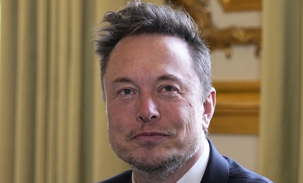 epa10629001 Twitter, now X. Corp, and Tesla CEO Elon Musk poses prior to his talks with French President Emmanuel Macron (not in picture), at the Elysee Palace in Paris, 15 May 2023. More than 200 international business leaders are expected 15 May to atte